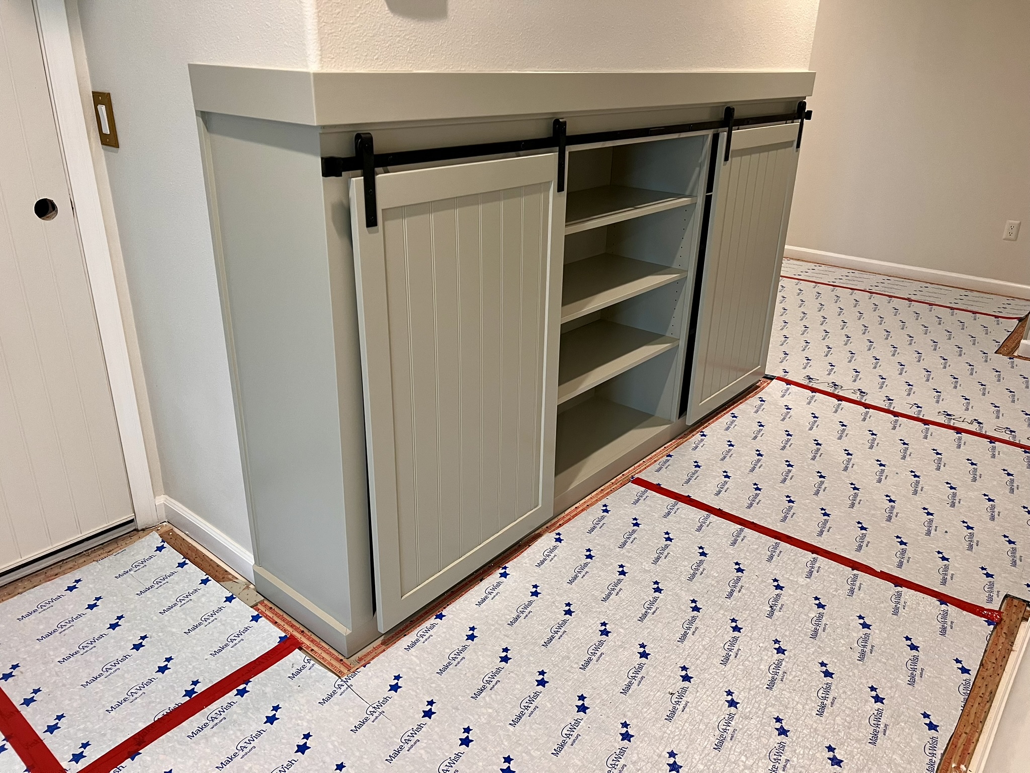 Custom built-in with sliding barn doors